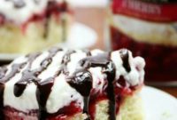 Gooey Cherry Marshmallow Bliss Poke Cake