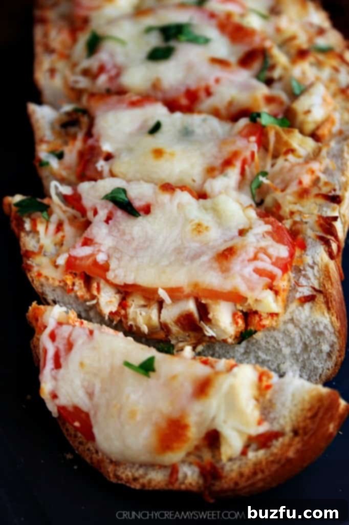Easy Cheesy Bread with Italian Chicken and Sweet Pepper Sauce, ready to serve.