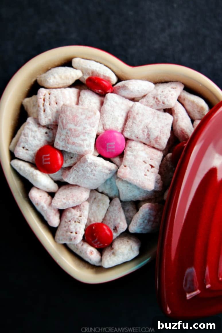 Vibrant Valentine's Day Puppy Chow with pink and red hues