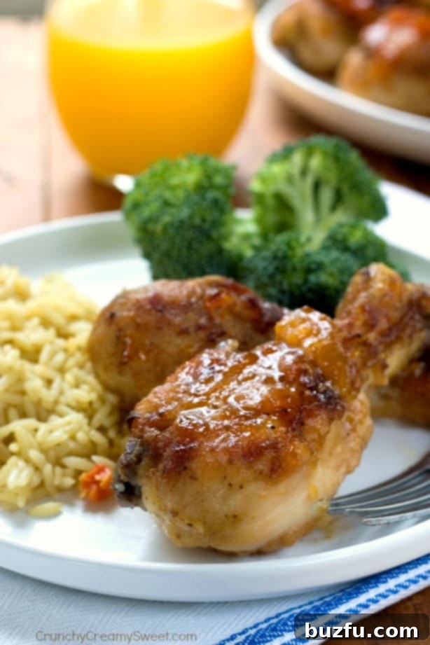 Tender Apricot Baked Chicken, glazed with a sweet and savory sauce.
