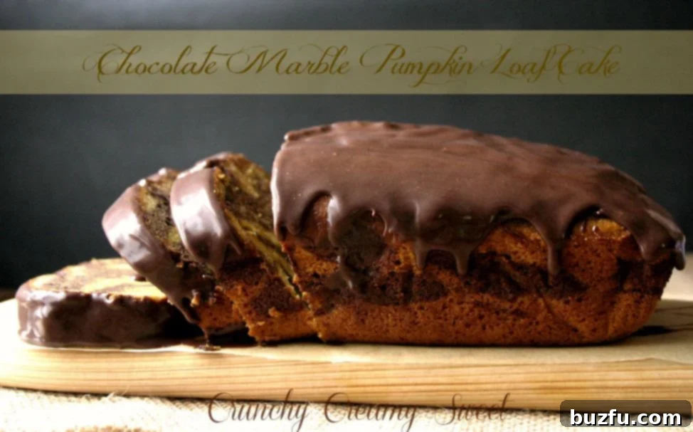 Swirled Chocolate Pumpkin Harvest Loaf 2 A freshly baked Chocolate Marble Pumpkin Loaf Cake with rich chocolate glaze, presented on a wooden cutting board, ready to be sliced.