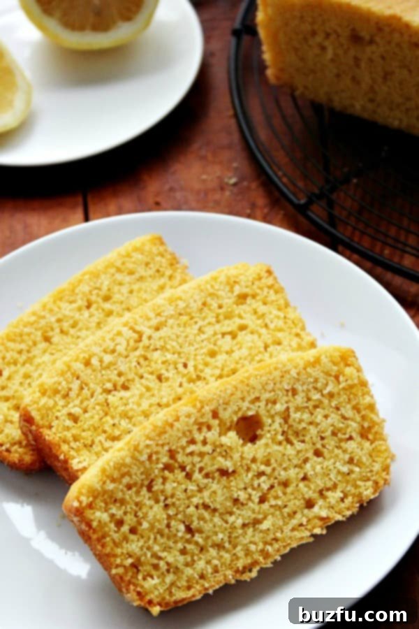 Sliced Lemon Cornbread on a plate, showcasing its soft interior.