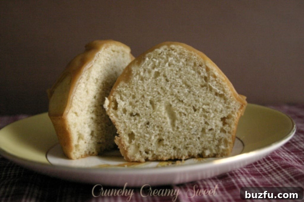 A detailed view of the fluffy and moist interior of a Spice Donut Muffin, highlighting its light texture.