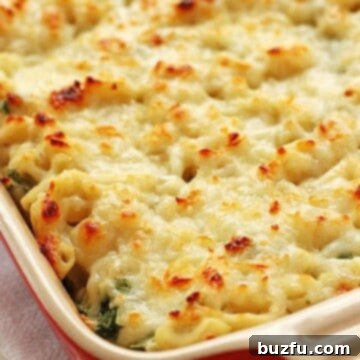 Healthy Spinach Dip Mac and Cheese in casserole dish.