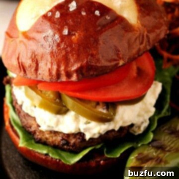 Ultimate Jalapeno Popper Burger 2 Jalapeno Popper Burger on a skillet.