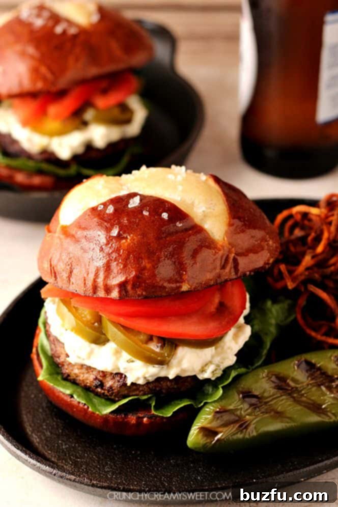 Gourmet Jalapeno Popper Burger ready to be enjoyed A delicious Jalapeno Popper Burger presented artfully on a plate