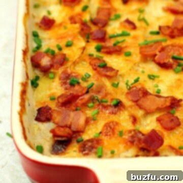 Tangy Buttermilk Ranch Potato Gratin 2 Delicious Buttermilk Ranch Potato Gratin, a creamy potato casserole with crispy bacon and melted cheese.