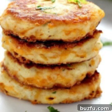 Stack of golden-brown crispy potato cakes.
