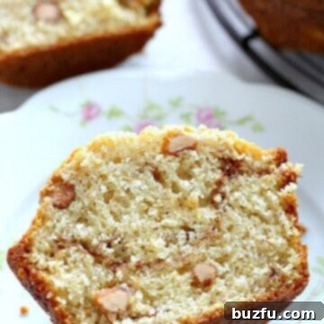 Ultimate Cinnamon Swirl Peanut Butter Banana Muffins 2 Cinnamon Swirl Peanut Butter Banana Muffin on a plate.