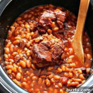 Baked beans with ham bone in slow cooker.