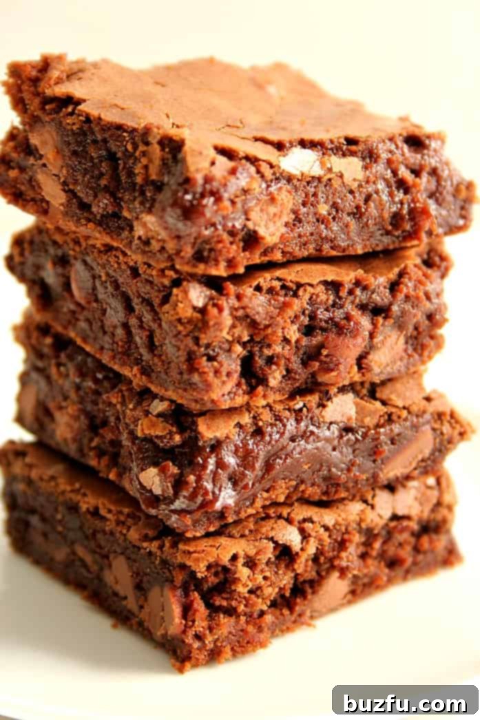 Brownies stacked up on each other.