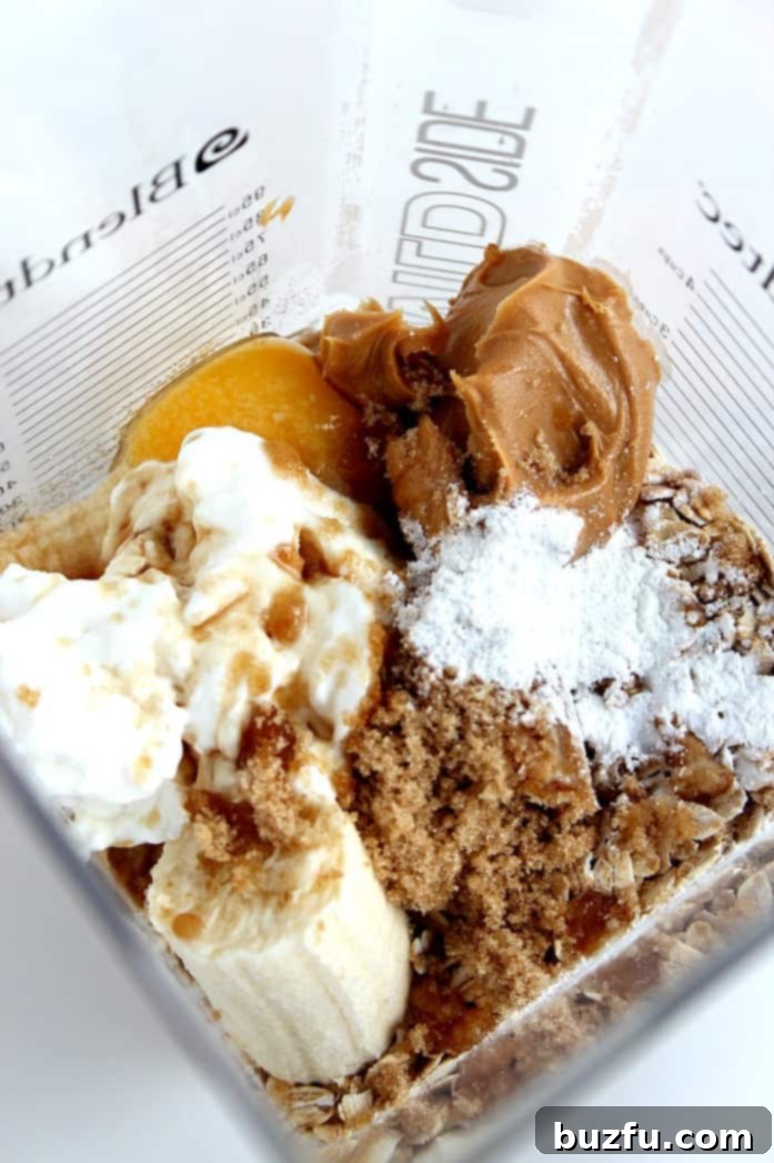 Closeup of fluffy flourless peanut butter blender muffins with chocolate chips.