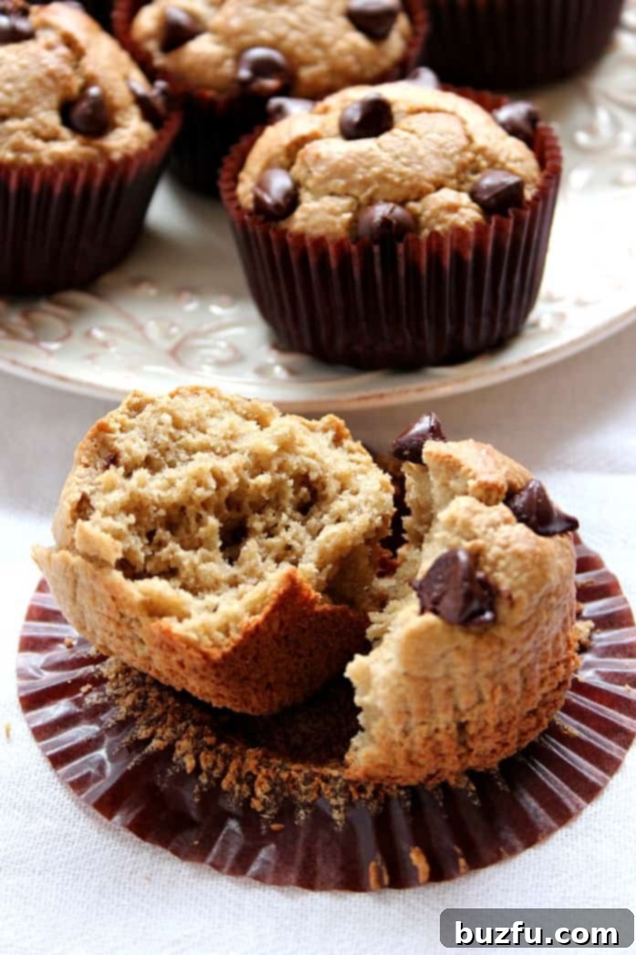 Flourless peanut butter blender muffins cooling on a wire rack.