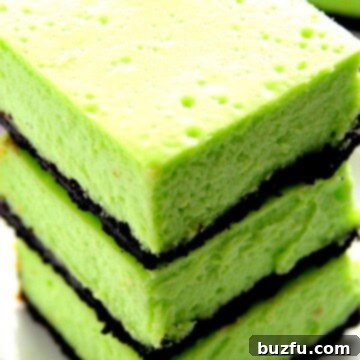 Mint Cheesecake Bars stacked up.