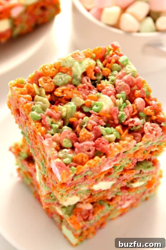 Close-up of the gooey and colorful Ice Cream Pebbles Marshmallow Cereal Bars, highlighting the texture and fun.