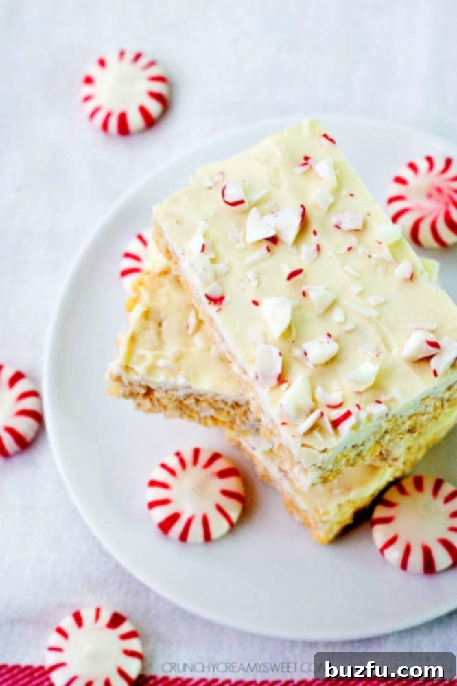 Holiday-themed Peppermint White Chocolate Rice Krispies bars, perfect for a festive treat.