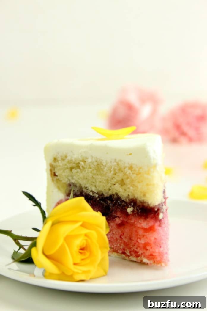 Inside the Lemon Raspberry Ombre Layer Cake: Flavors and Texture Close-up of a slice of Lemon Raspberry Ombre Layer Cake revealing moist lemon cake, raspberry filling, and gradient frosting.