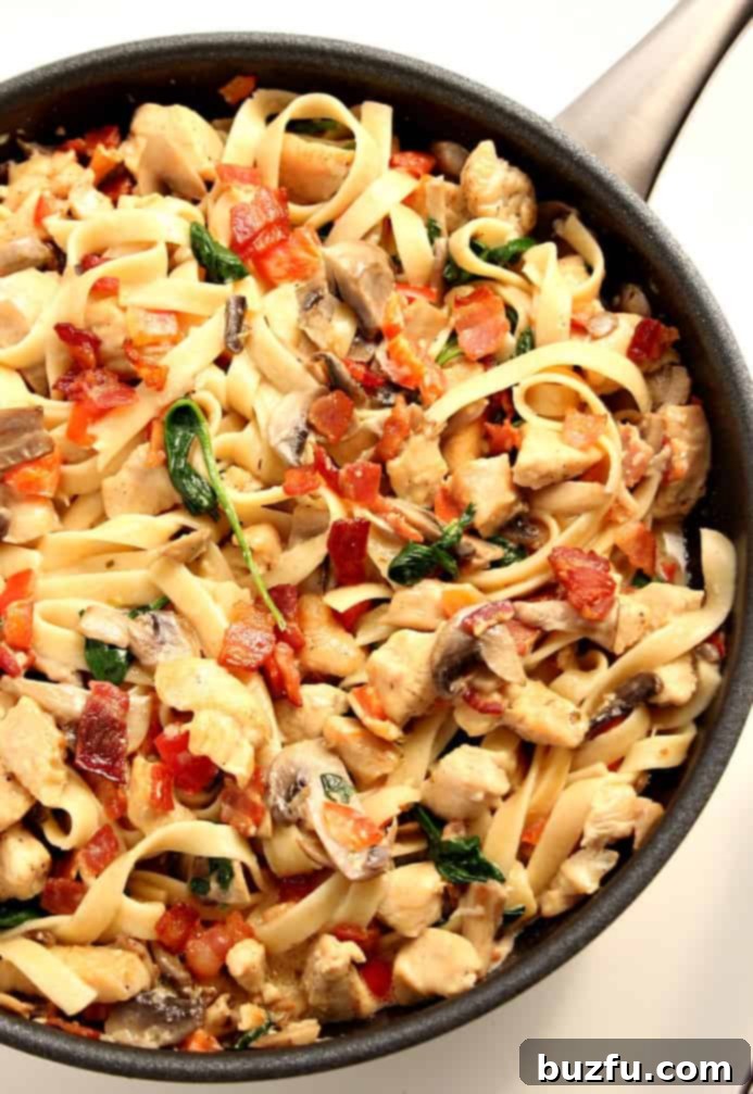 Creamy Mushroom Chicken Pasta in skillet.