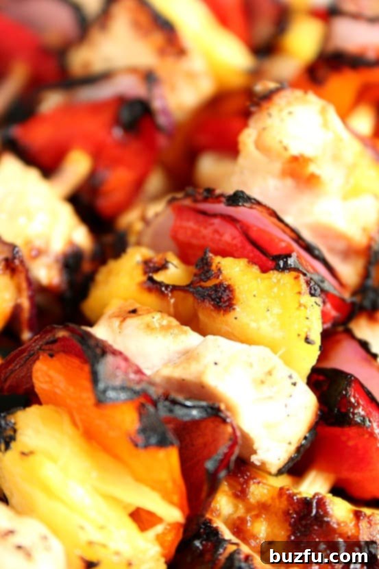 Ready chicken kabobs close up. Perfectly grilled with a caramelized glaze and slight char.