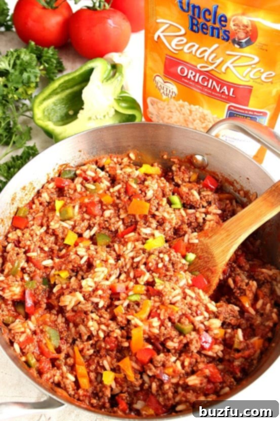 A close-up of the Stuffed Pepper Rice Skillet, showing the appealing mix of ingredients and suggesting its role as a satisfying, easy family dinner.