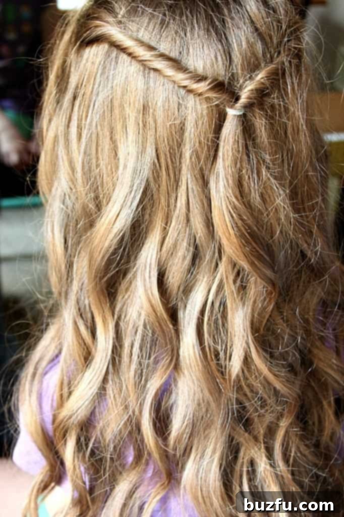 Woman showcasing beautifully styled, long-lasting curls achieved with a NuMe curling wand, looking confident and stylish for back to school.