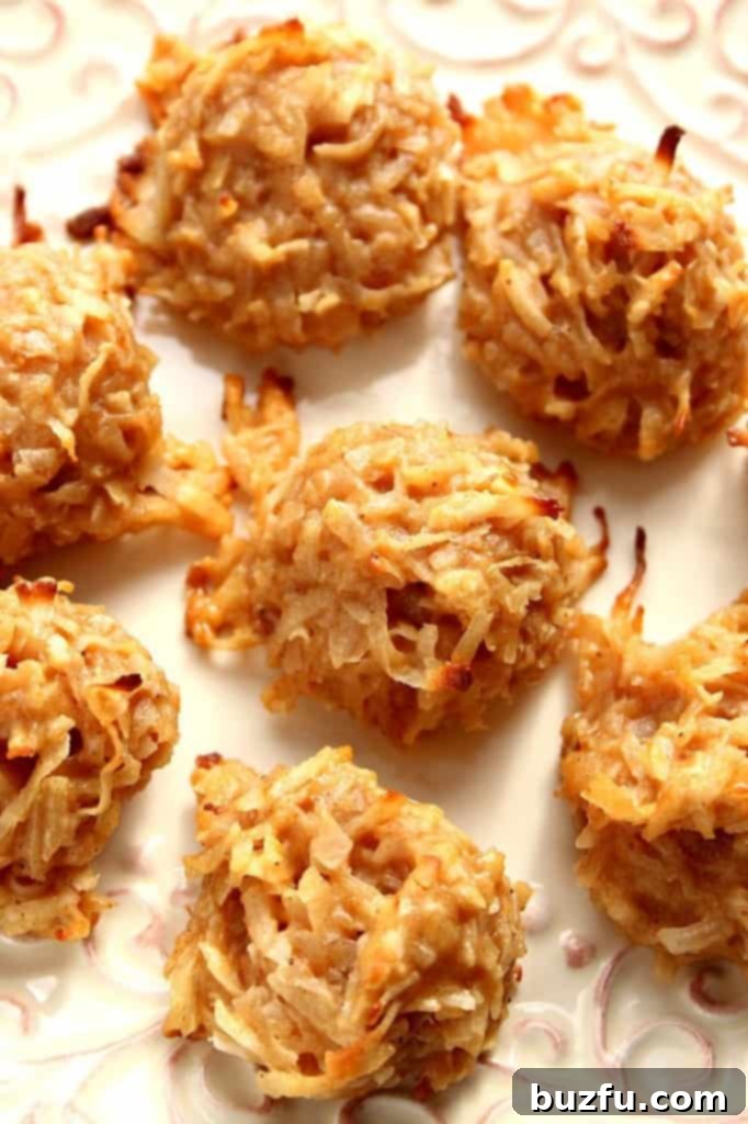 Close-up shot of Pumpkin Spice Coconut Macaroon Cookies, highlighting their texture and festive appeal.