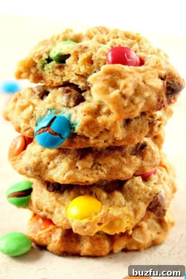 Delicious Oatmeal M&M Cookies stacked on a plate, showcasing their soft texture and colorful candies.