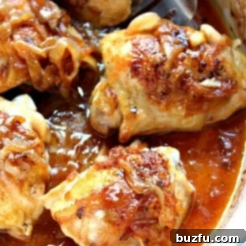 Caramelized Onion Roasted Chicken 3 French Onion Roasted Chicken in a large Dutch oven, garnished with fresh thyme.