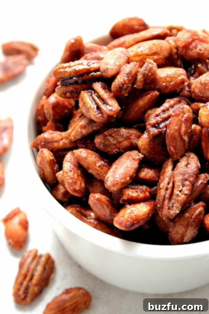 Crock-Pot Candied Spiced Nuts Recipe - Easy slow cooker snack for holiday movie nights.