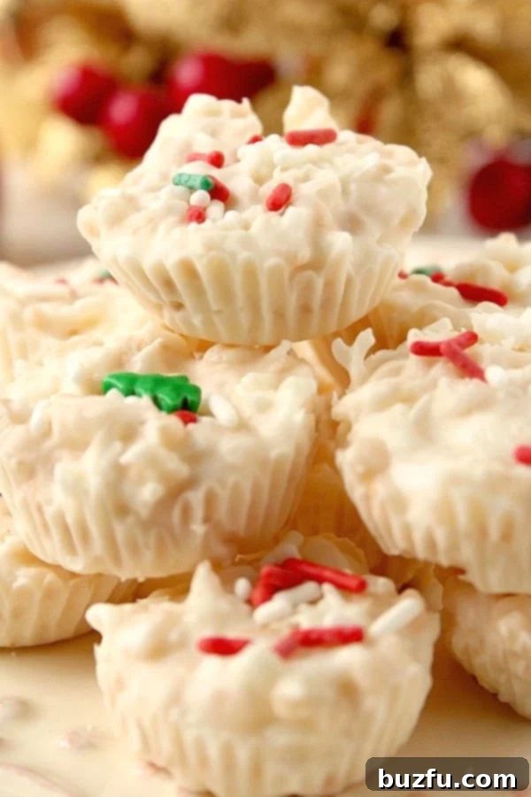 Chocolate cups stacked on plate, highlighting the delicious texture and inviting appearance of Coconut Crunch White Chocolate Cups.