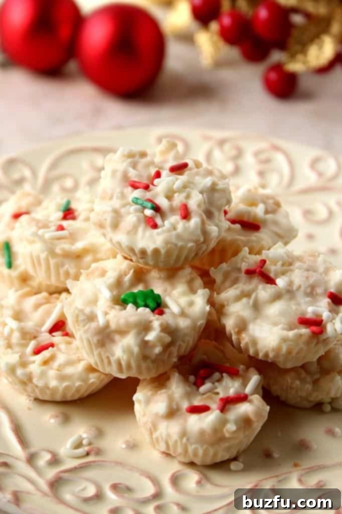 Close-up of Coconut Crunch Chocolate Cups, showcasing the texture of coconut and crispy rice within the white chocolate.