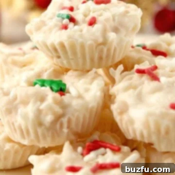 Finished Coconut Crunch White Chocolate Cups stacked on a plate, ready to serve.