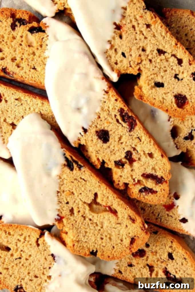 White Chocolate Cranberry Banana Biscotti: A Festive Holiday Cookie Recipe Indulgent White Chocolate Cranberry Banana Biscotti, perfectly baked and dipped, ready to enjoy as a festive holiday treat.