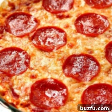 Close up shot of baked pepperoni pizza dip.