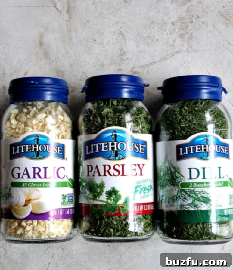 Collection of large Litehouse freeze-dried herb containers, including dill, parsley, and garlic.