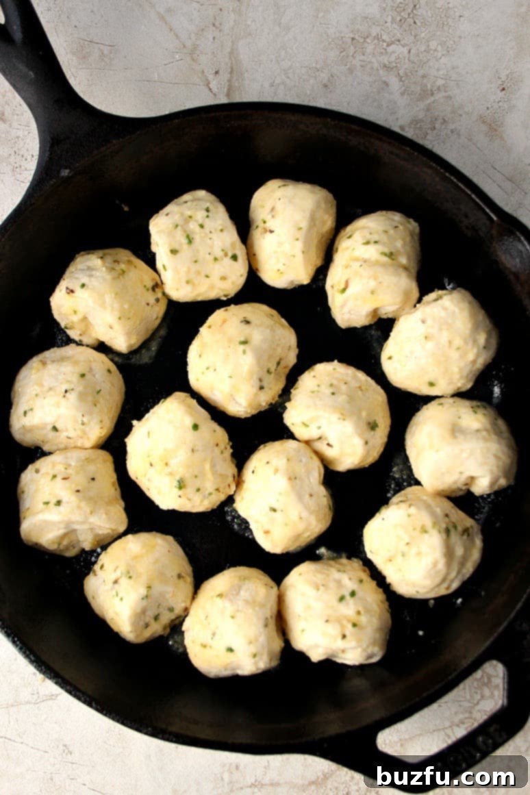 Close-up of golden brown Garlic Parmesan Skillet Rolls fresh out of the oven.