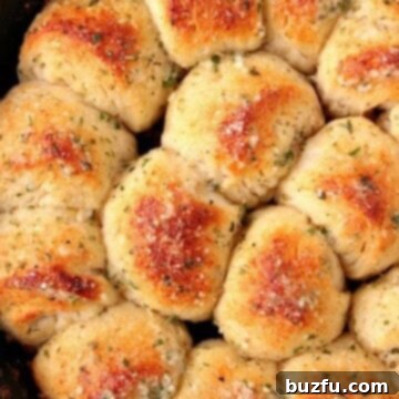 Garlic Parmesan Skillet Rolls in cast iron skillet.
