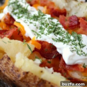 Baked Potato Perfection in Your Slow Cooker 3 Slow Cooker Baked Potato with toppings.