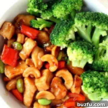 Chicken with broccoli in white bowl.