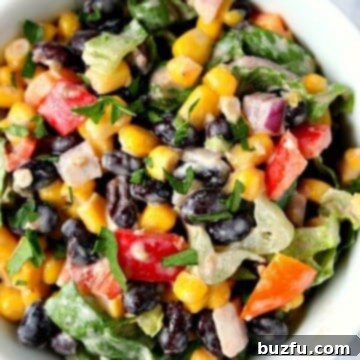 Black Bean Taco Salad in white bowl, ready to serve.