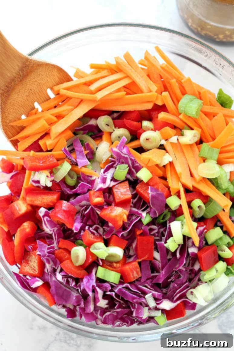 Asian Chopped Salad with Garlic Sesame Vinaigrette Recipe Close-up of crispy Sweet Chili Pollock Tenders, perfectly cooked and glazed, ready to be served with a fresh Asian Chopped Salad for a complete meal.