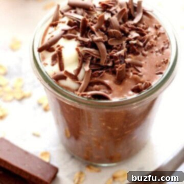 Chocolate Peanut Butter Overnight Oats in a jar, ready to be served.