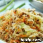 Side shot of egg roll filling in a bowl, ready to eat.