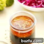 Homemade Asian Sesame Dressing in a glass jar.