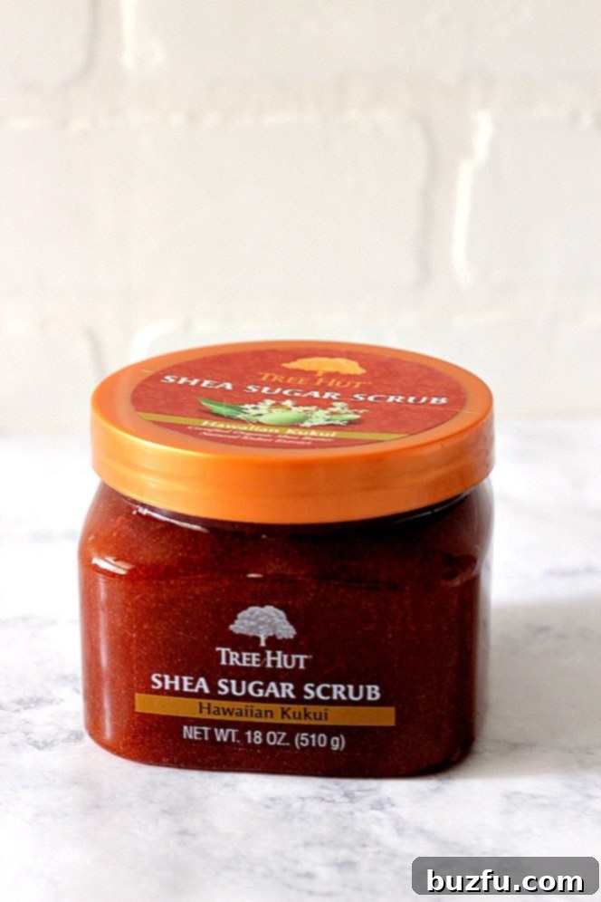 Tree Hut Shea Sugar Scrub, Hawaiian Kukui scent, for luxurious exfoliation with natural oils and organic shea butter.