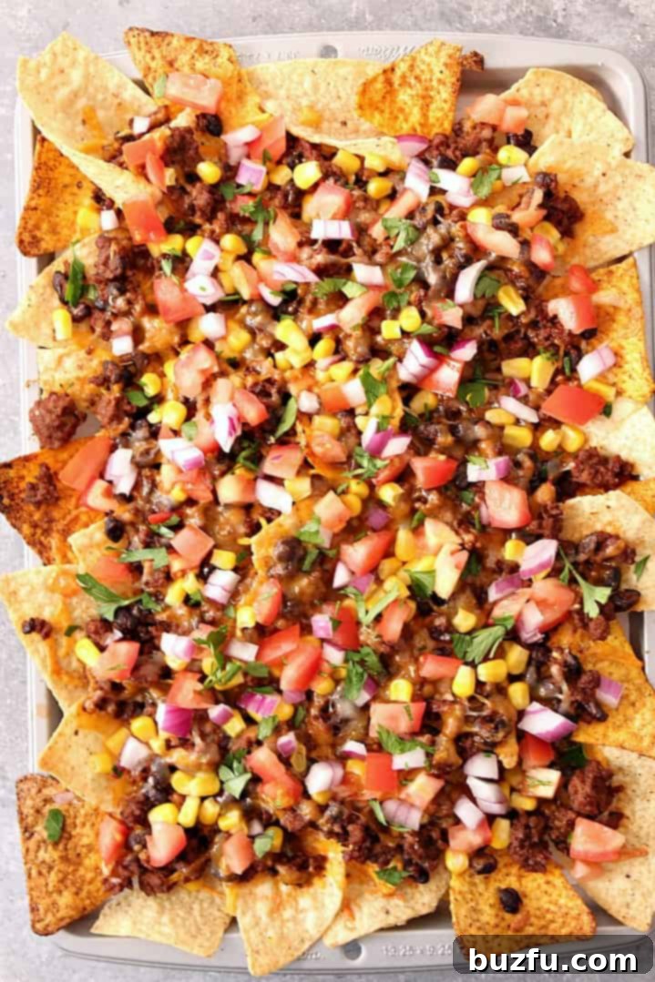 Nachos on a baking pan ready to be served.
