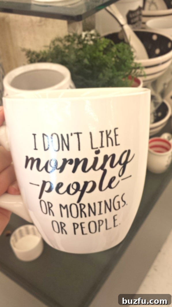 A large, humorous mug with text 'I'm not a morning person' displayed, symbolizing the start of the day for coffee lovers.