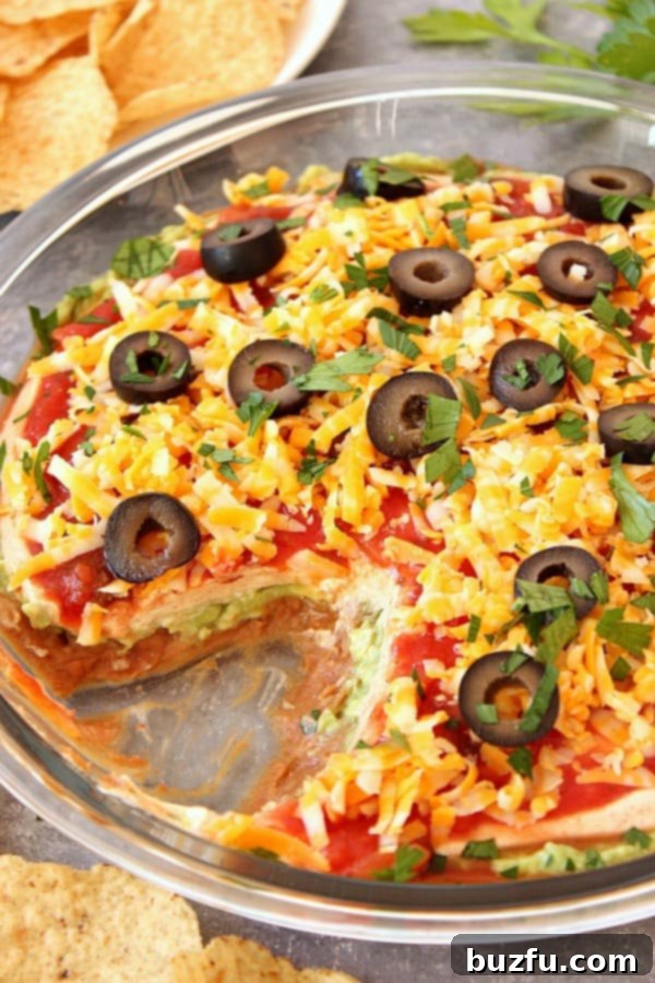 Mexican 5 Layer Dip in glass pie plate.