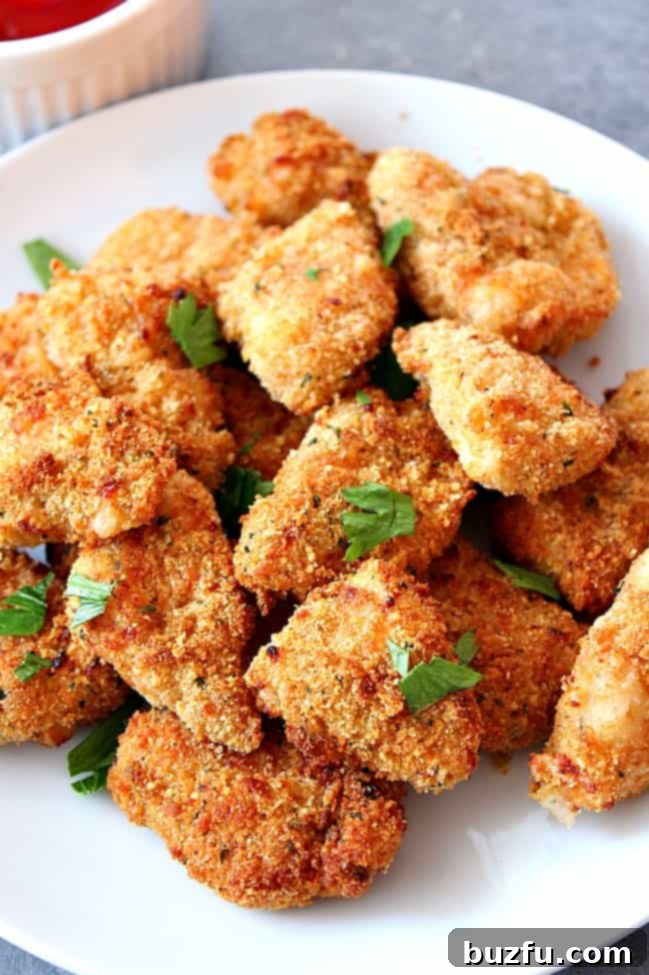 Homemade Air Fryer Chicken Nuggets: Crispy, Healthy, and Kid-Friendly Air Fryer Chicken Nuggets Recipe - A healthier, crispy, and juicy option for a kid-friendly dinner! Easy homemade chicken nuggets, breaded and baked to perfection in an air fryer.