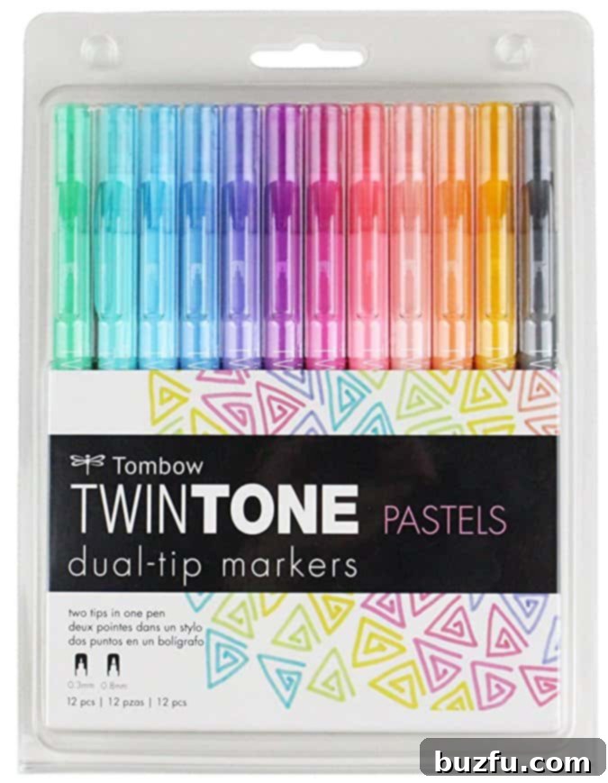 A vibrant display of Tombow TwinTone dual-tip markers in pastel colors, fanned out to show their range.